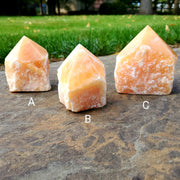 ORANGE CALCITE TOP POLISHED POINT